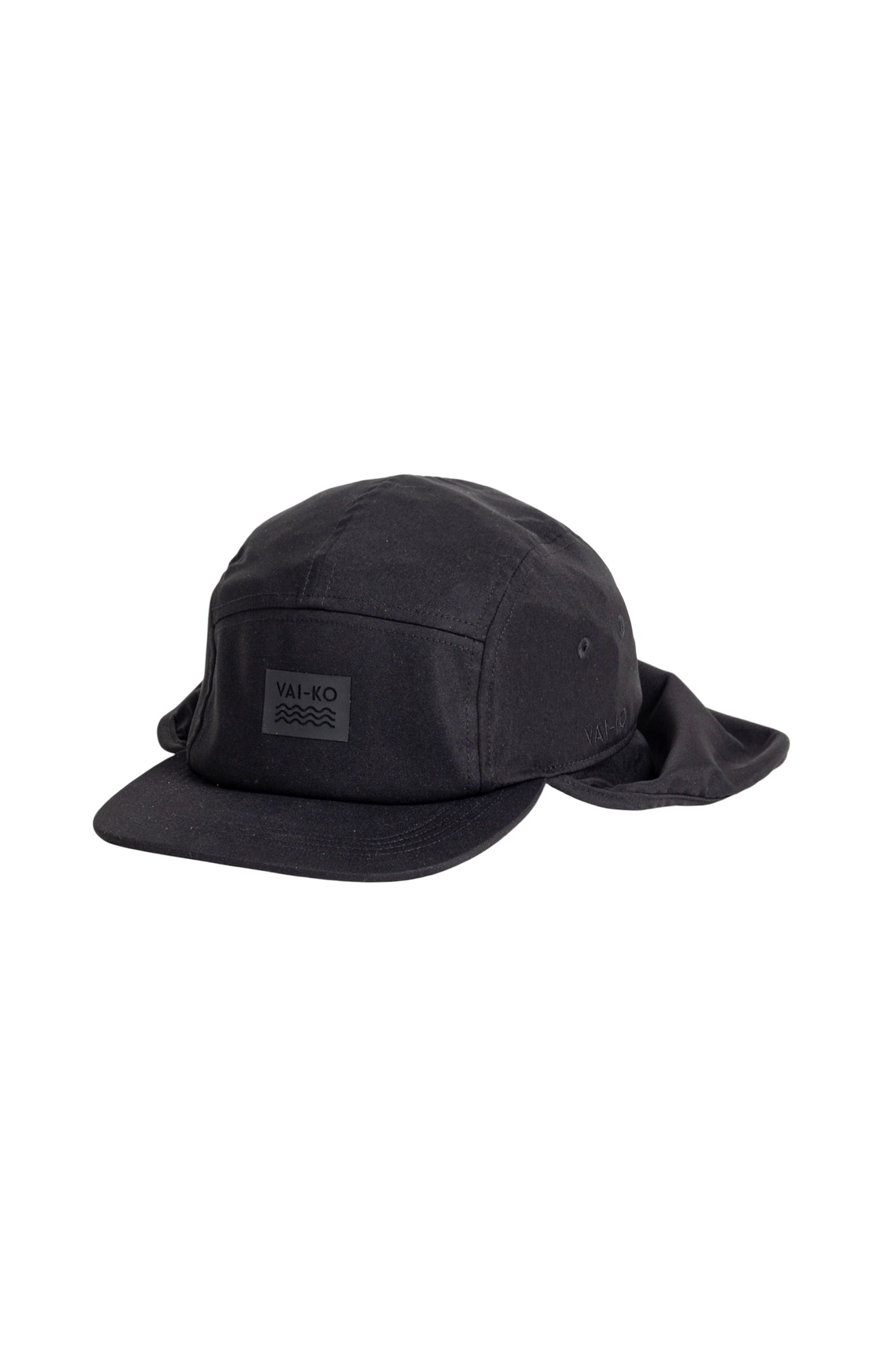 Black cap with a flat brim and neck flap, featuring a rectangular VAI-KO patch on the front.