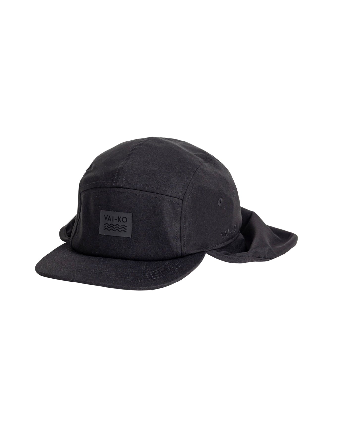 Black cap with a flat brim and neck flap, featuring a rectangular VAI-KO patch on the front.