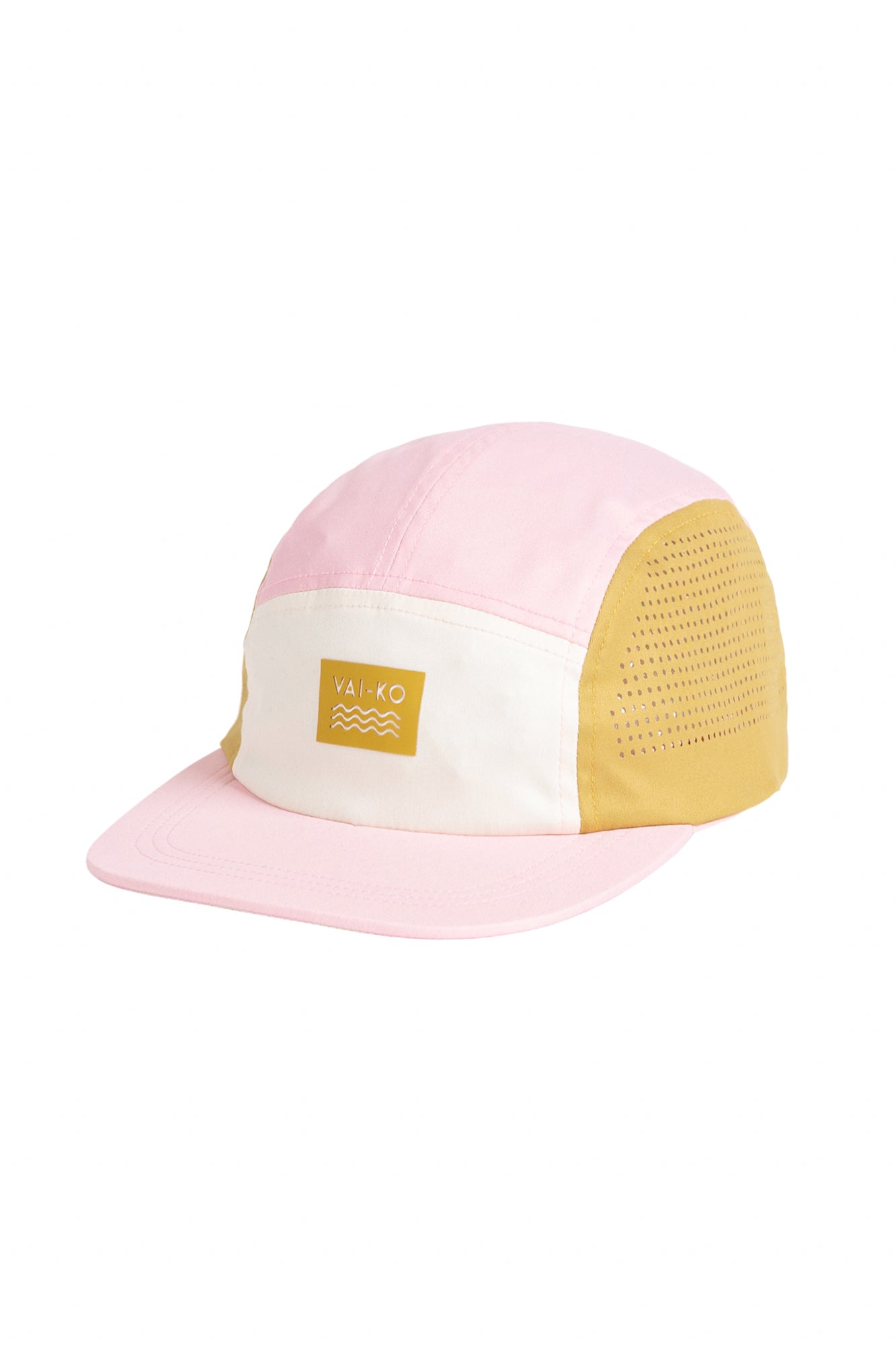 A pastel pink, white, and mustard yellow cap with a VAÏKO logo patch on the front.