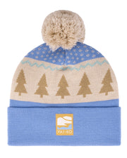 Blue knit beanie with a beige pattern of trees, a pom-pom on top, and a VAI-KO label on the cuff.