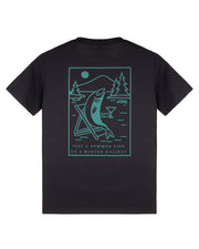 Black t-shirt with a turquoise graphic of a fish skiing, mountains, trees, and text below the image.