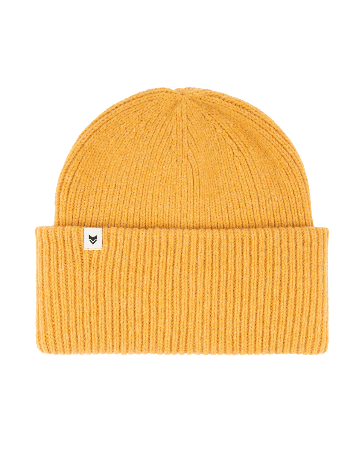 A mustard yellow knit beanie with a folded cuff and a small white tag on the front.