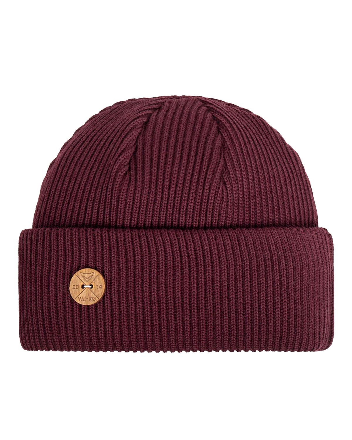 A maroon knit beanie with a wide folded brim and a round tan logo patch on the front.
