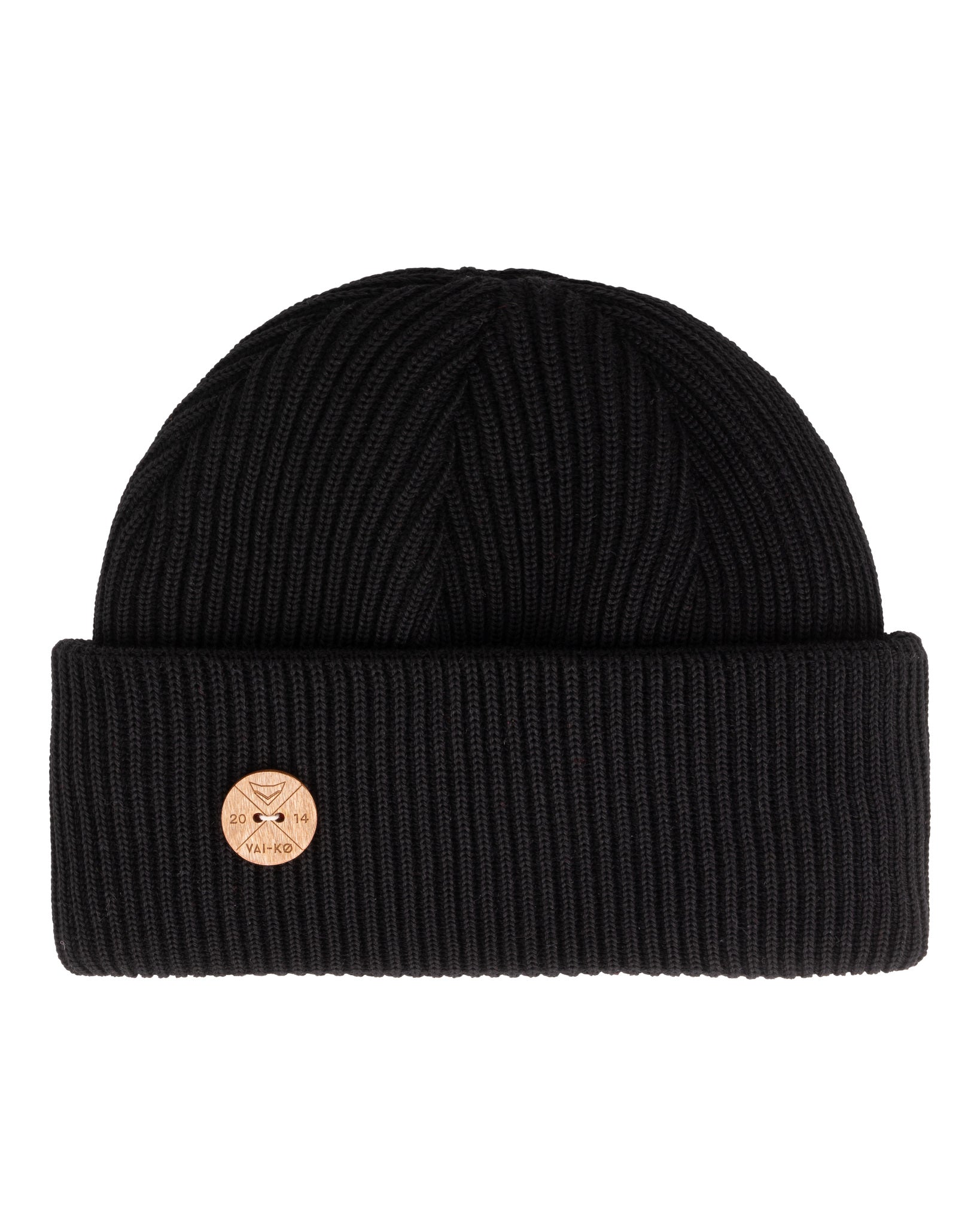 Black ribbed knit beanie with a folded brim and a small round brown patch on the front.