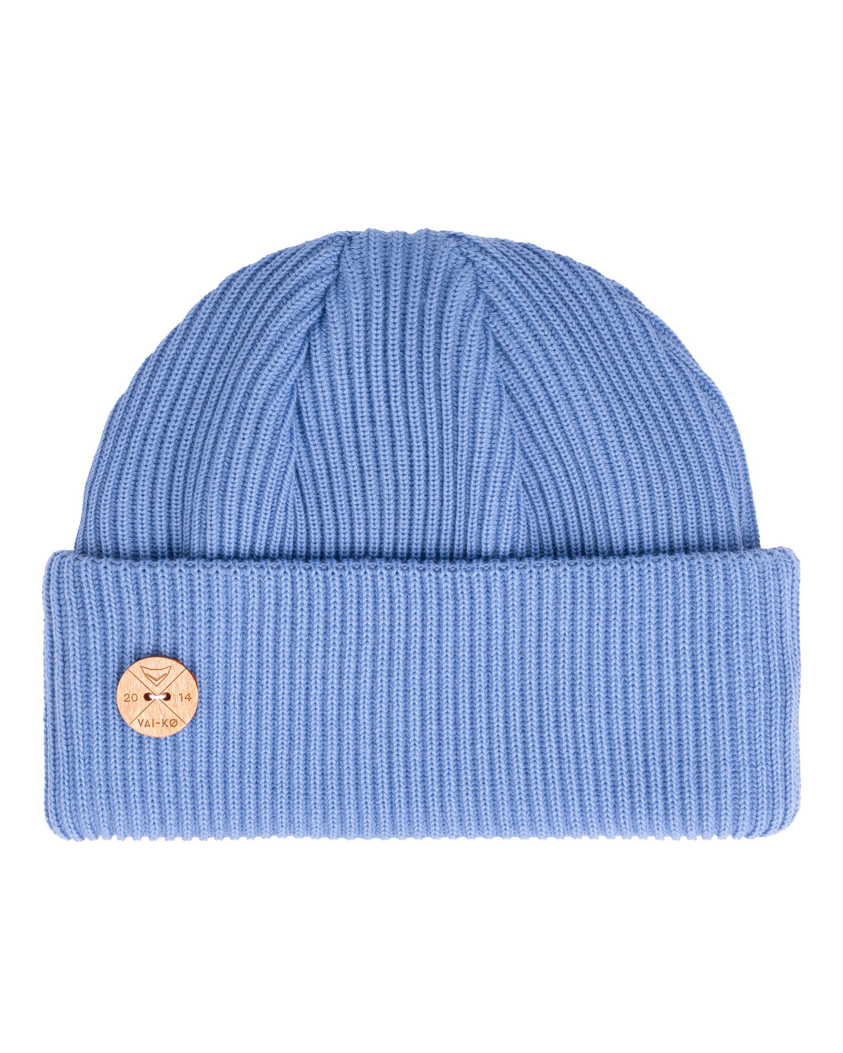 Light blue ribbed knit beanie with a folded brim and a small tan circular patch on the brim.