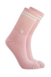 Pair of pink crew socks with two white stripes near the top and a small white cat face design on the side.